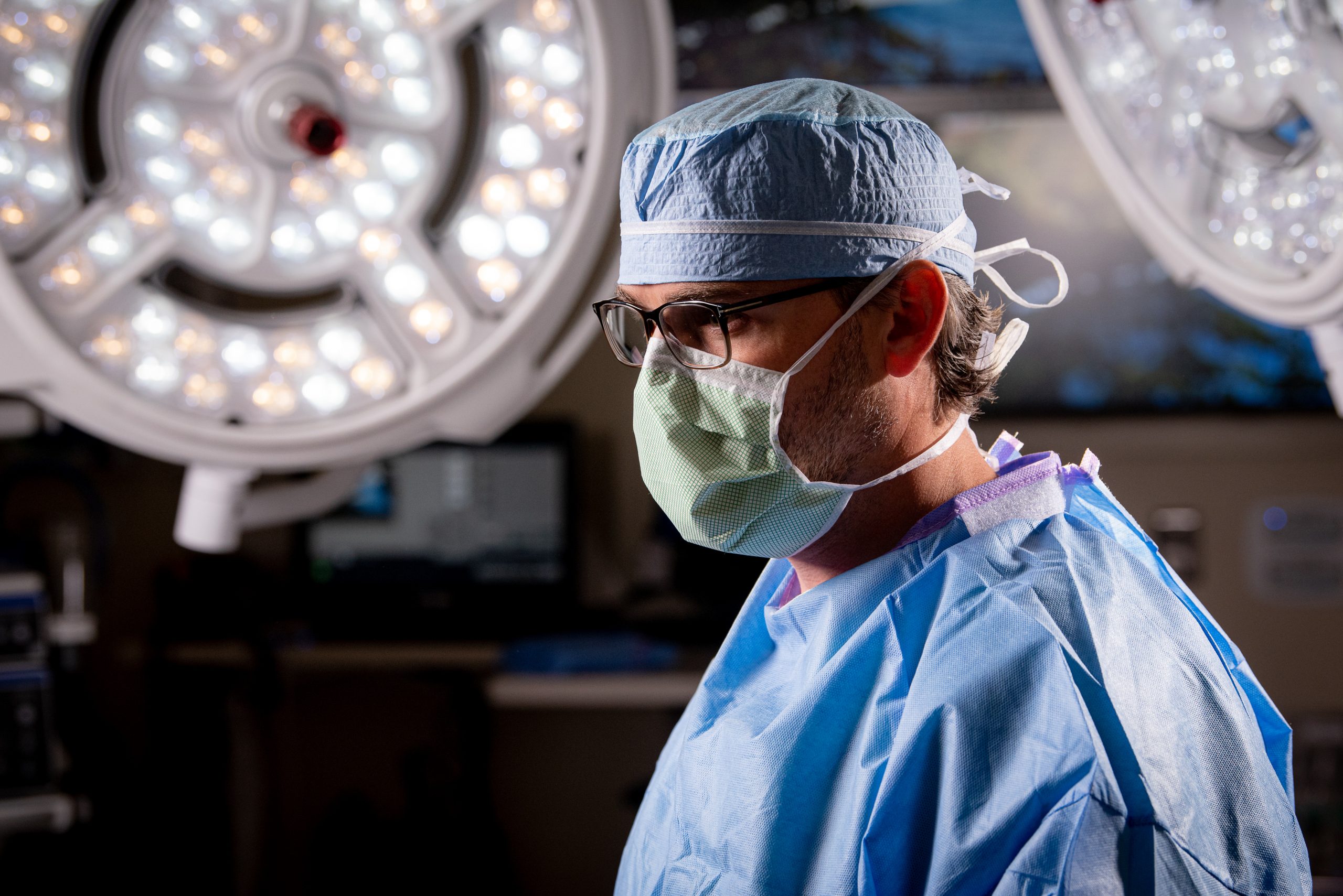 Dr. Koonce in medical scrubs