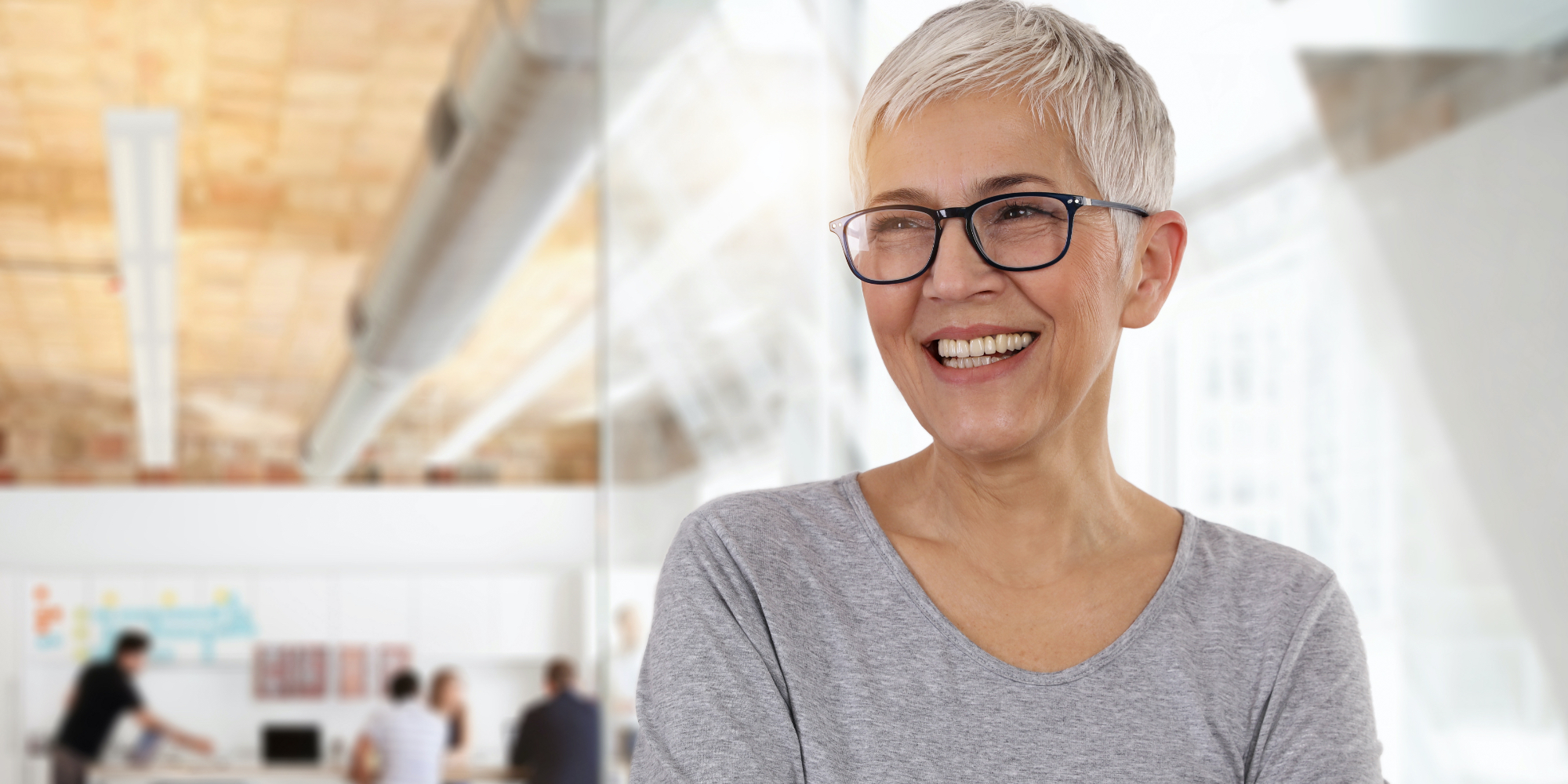 Happy older woman wearing glasses